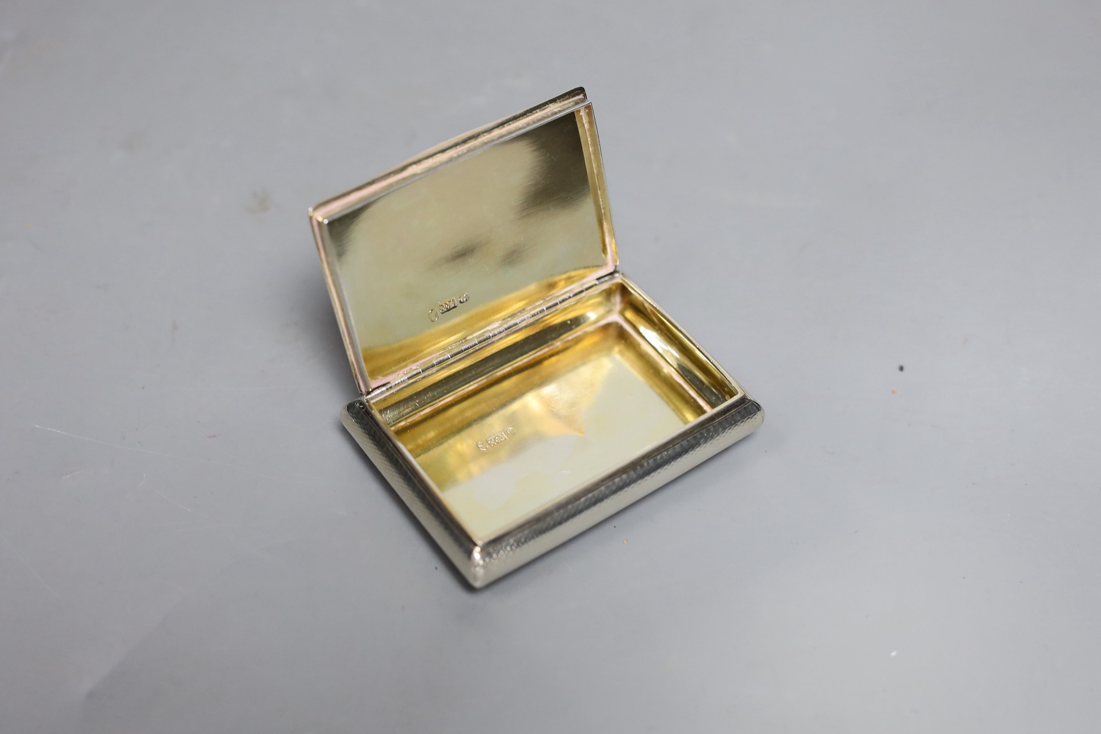 An early Victorian silver rectangular bombe shaped snuff box, by Nathaniel Mills, Birmingham, 1839, 83mm.